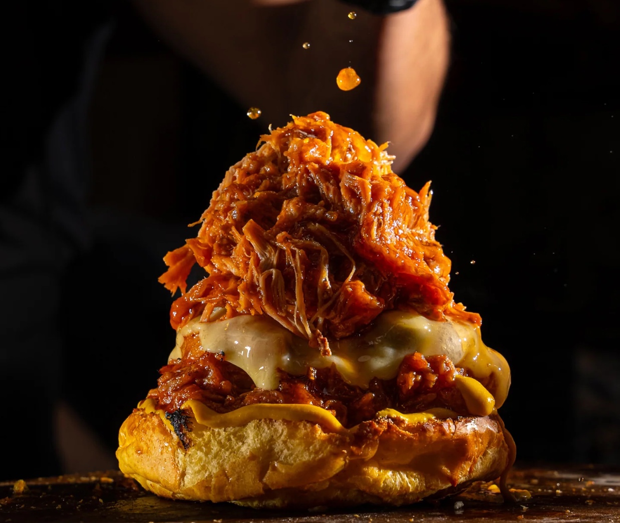 /images/dirtyBagels/briochebunpulledporkwithextrameat.jpg